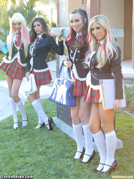 Busty yellow-haired schoolgirl Tasha Reign and her friends strip and pose together