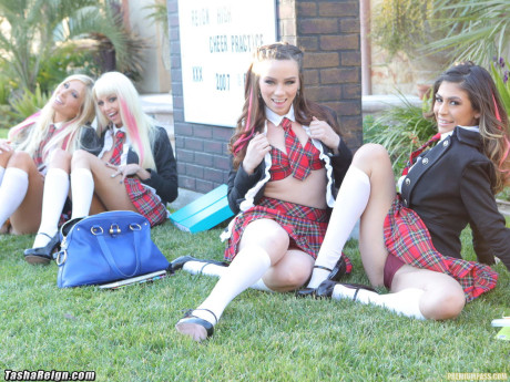 Busty yellow-haired schoolgirl Tasha Reign and her friends strip and pose together