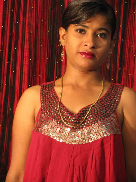 Indian MILF with short hair shows her gaped snatch during solo action