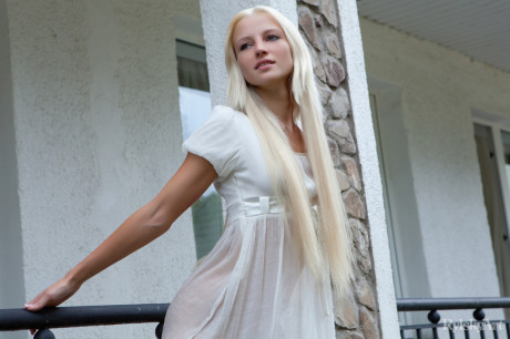 Innocent blondie young from Estonia frees her lady GF lady parts from her white dress