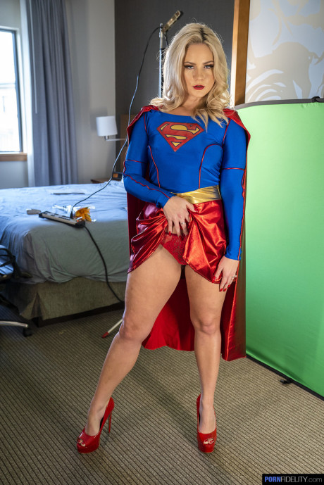 Blondie supergirl Lisey lovely exposes her tasty ass and hot melons in a solo