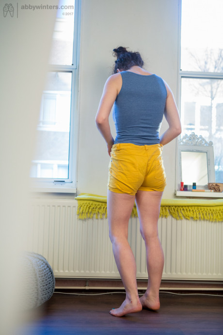 Undressed amateur Livia V is secretly filmed getting dressed by a hidden camera