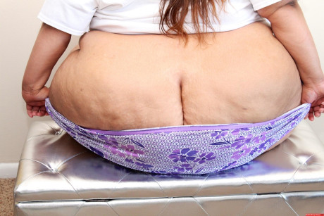 Amateur SSBBW Golden Bombshell slips lingerie over her behind crack