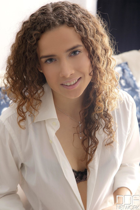 Curly haired beauty Carolina reveals her snatch and gets it stuffed deeply