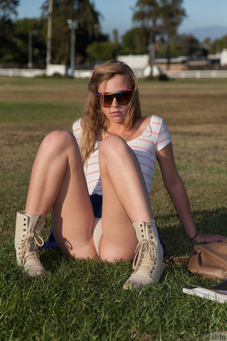 Hot college young with fine thighs Marley Kunis flashing an upskirt in public