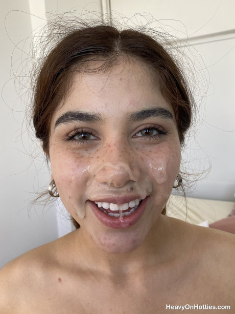 Fresh teenie amateur takes a cumshot on her freckled face during POV action