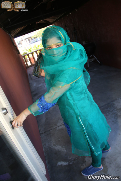 Clothed Indian Nadia Ali gets nude after finding a BBC poking thru gloryhole