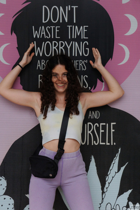 Ravishing attractive curly haired babe Gabriella Noren shows her tiny boobs and her enormous butt