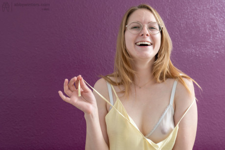 Nerdy Australian babe Kayla J exposes her hard nips and furry armpits and twat