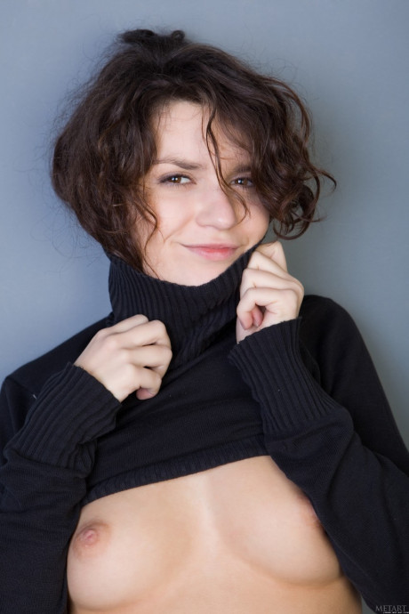 Curly-haired young Roza A undresses and flaunts her bushy holes in a solo