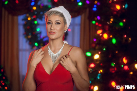 Hispanic teen Melissa Moore poses in a hot skimpy outfit at a Xmas party