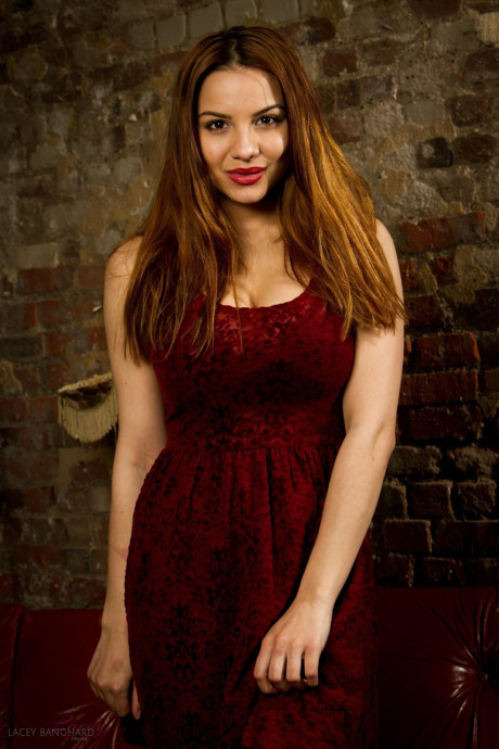 Lovely British ginger head Lacey Banghard takes off a red dress to go undressed