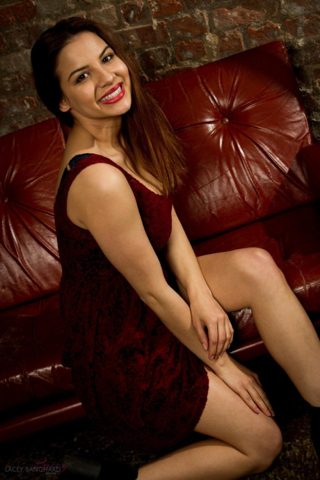 Lovely British ginger head Lacey Banghard takes off a red dress to go undressed