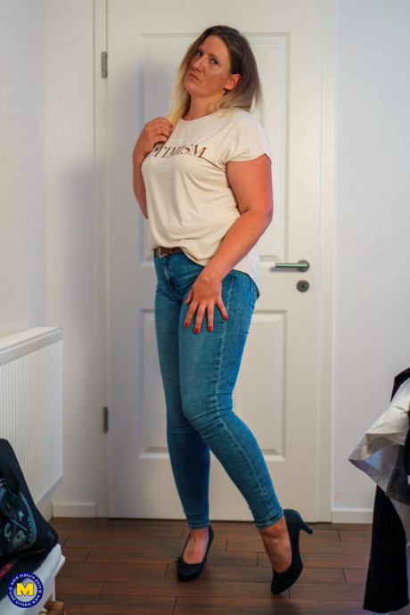 Old fatty Julia Winter models denim jeans before having POV sex