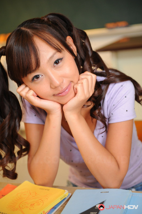 Pigtailed chinese beauty Nagisa posing in her attractive lovely outfit on the cam