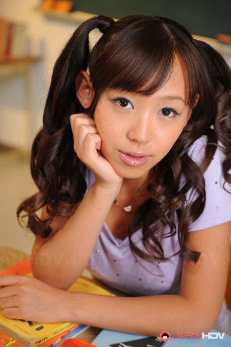 Pigtailed chinese beauty Nagisa posing in her attractive lovely outfit on the cam