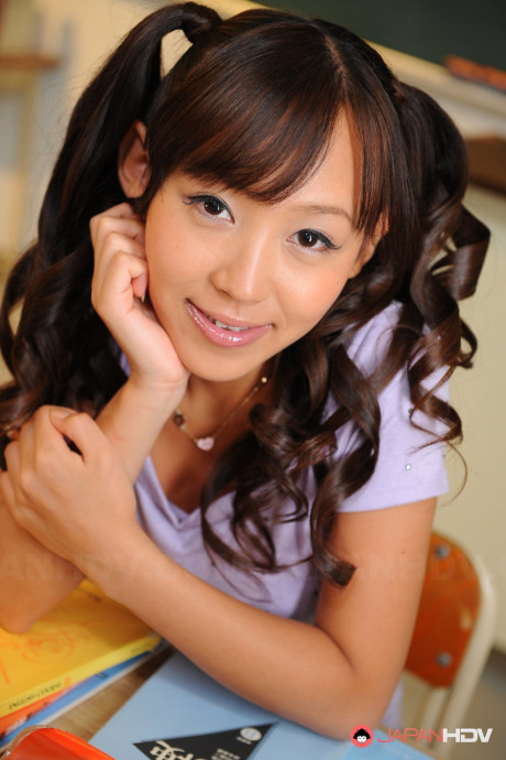 Pigtailed chinese beauty Nagisa posing in her attractive lovely outfit on the cam