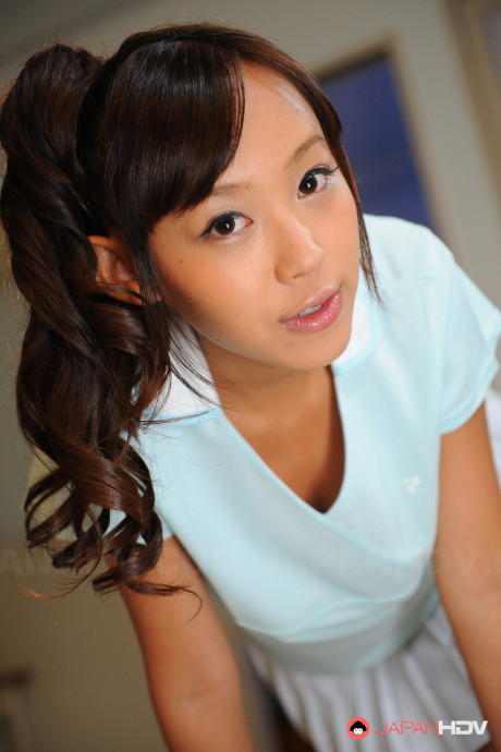 Pigtailed chinese beauty Nagisa posing in her attractive lovely outfit on the cam