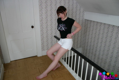 Teen amateur B4rbi3 lifts up her T-shirt to expose her firm boobies