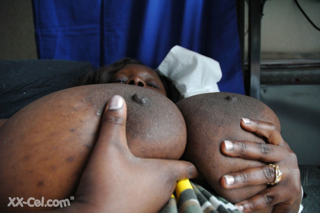 Wide ebony girl Mariana Kodjo showing off her gigantic natural titties
