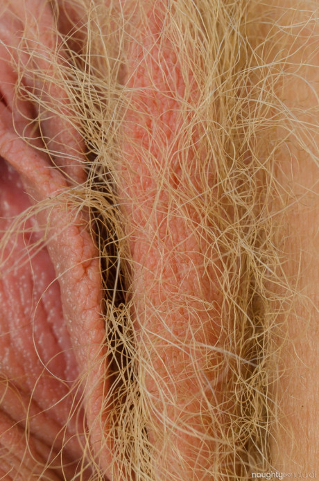 Amateur American Vestacia JonQuil reveals her humongous breasts & furry snatch in nature