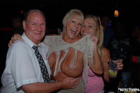 Amateur swinger Tracy suck and her girls play with horny males in a night club