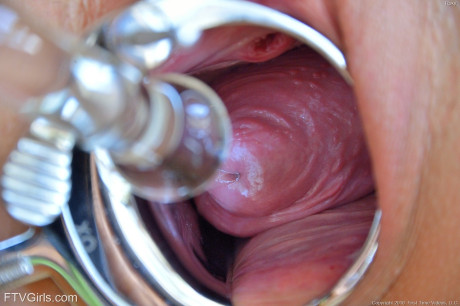 Young teenie babe Roxy fists her clam before playing with a snatch stretcher