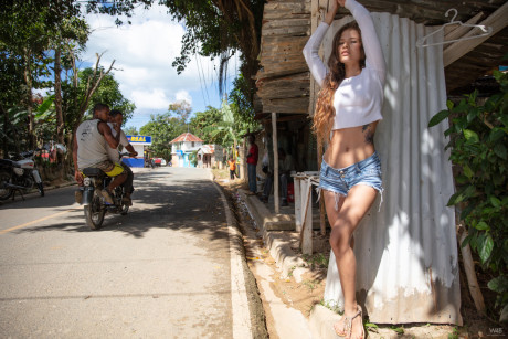 Fine delicious young in denim shorts Irene Rouse stretches her long legs wide in public
