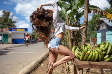 Fine delicious young in denim shorts Irene Rouse stretches her long legs wide in public