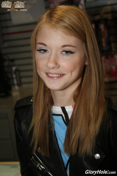 Fine teenie Hannah Hays shows her breasts and plays with a black gloryhole rod