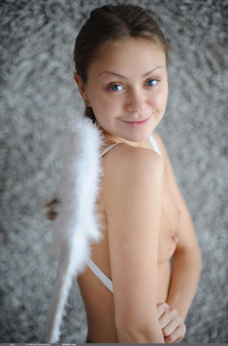 Petite angel Liza shows her off her tiny melons and poses erotically in the naked