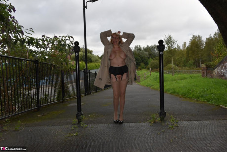 Cougar amateur Barby chick flashes in a trenchcoat while out in public places