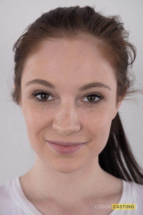 Tall teen Denisa shows her bald twat after standing naked for a modeling gig