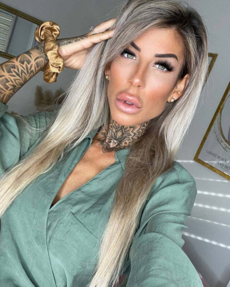 Yellow-haired amateur Jacky Inked poses in green lacy undies in a cute solo