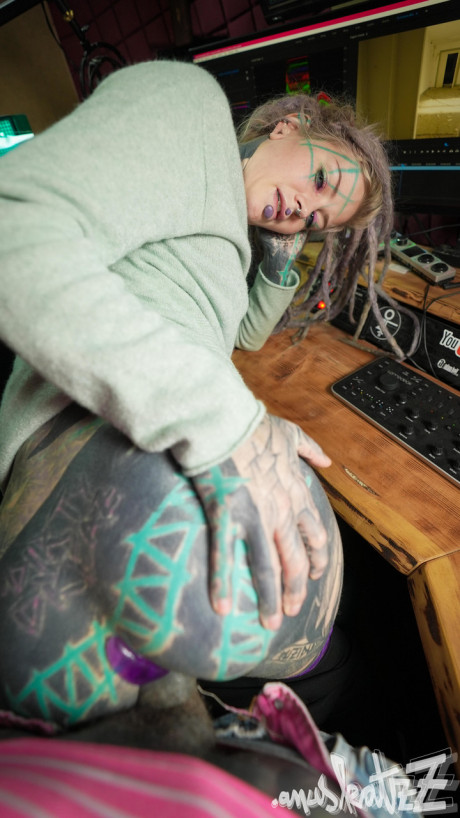 Heavily tattooed bitch girlfriend chick Lily Lu sports a ass plug while having sex