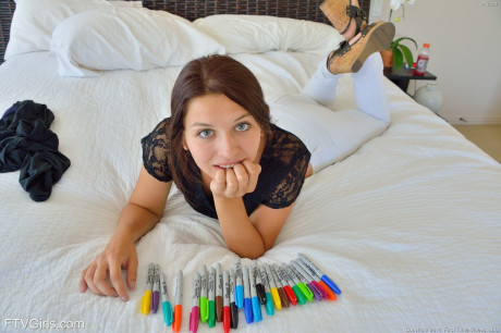 Kinky babe Ariana sits on a dildo & crams her bald vagina with a bunch of pens