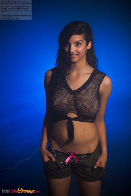 Indian female models non naked in a see thru top and shorts