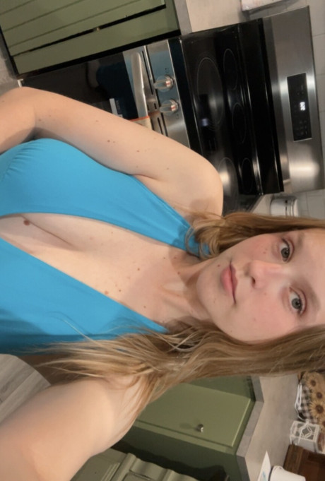 Amateur bitch girl lady looses her firm boobies from a blue dress in a galley