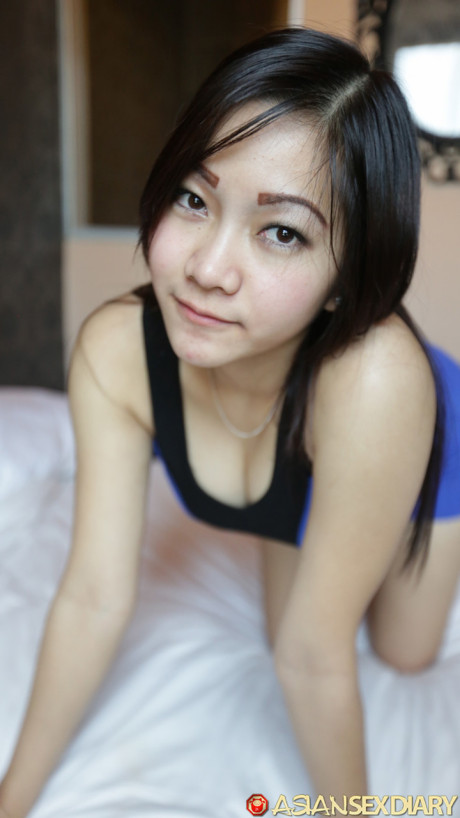Amateur cutie Angel D shows her huge breasts and enjoys POV sex at the hotel