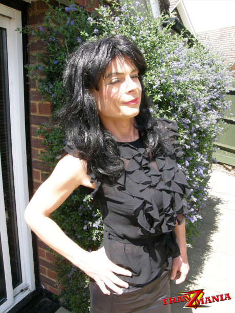 Filthy dark haired crossdresser enters the house then masturbates her hard