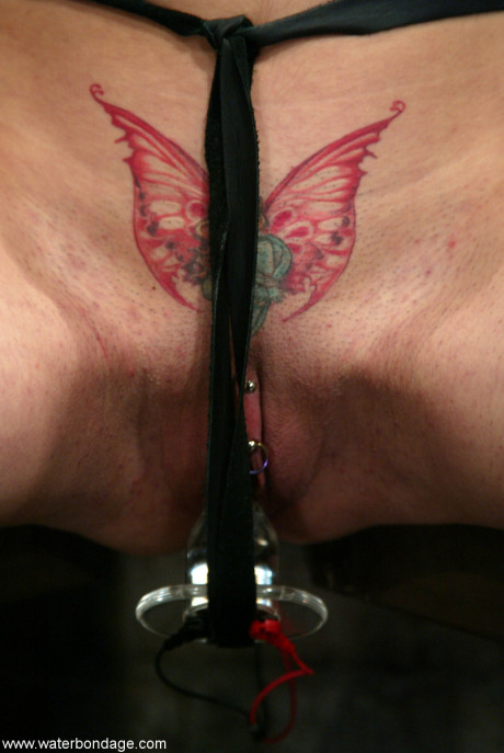 Maya Matthews endures being masturbated while in bondage and wet