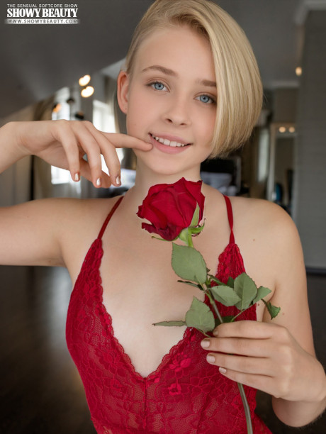 Lovely blonde teenie Kamilla takes off red underwear to go raw nude