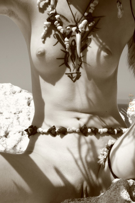 Native Indian babe flaunting her small boobies and hot pussy outdoors