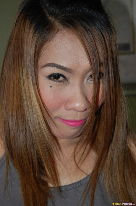 Amateur oriental babe Yuri stripping and flaunting her bushy twat