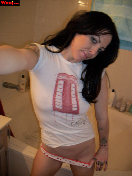 Brunette babe posing for selfies and showing her humongous butt in cotton panties