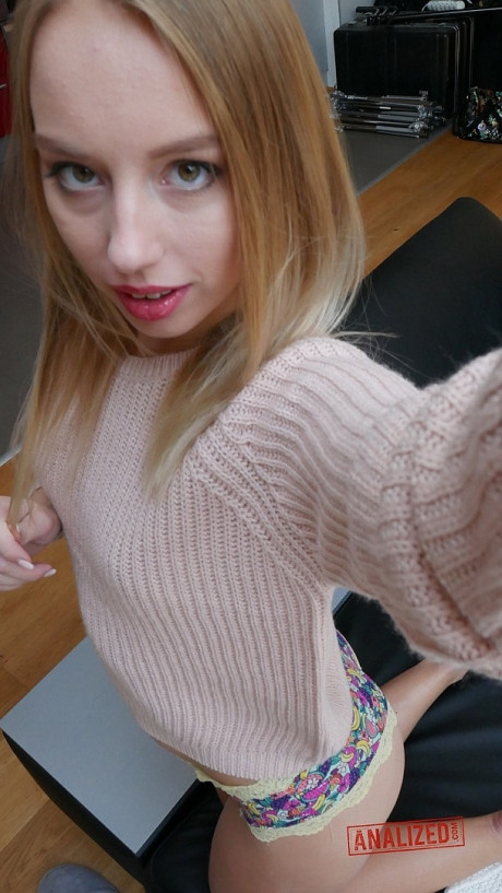 Slutty teen Kira Thorn flashes her boobs and displays her amazing round booty