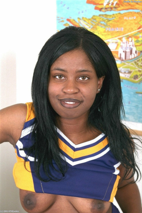 Ebony amateur cheerleader Holly flaunts her monstrous breasts and monstrous behind in a solo