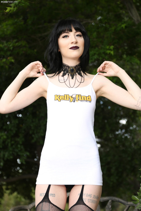 Goth pornstar in ebony Charlotte Sartre rides Ryan Madison's dong in the bed