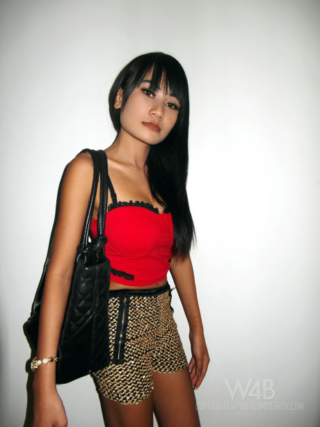 Yummy oriental models strip and flaunt their charming slender bodies