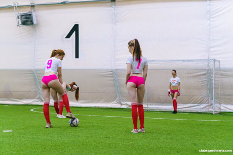 Petite young soccer players undressing and rubbing each other's muffs